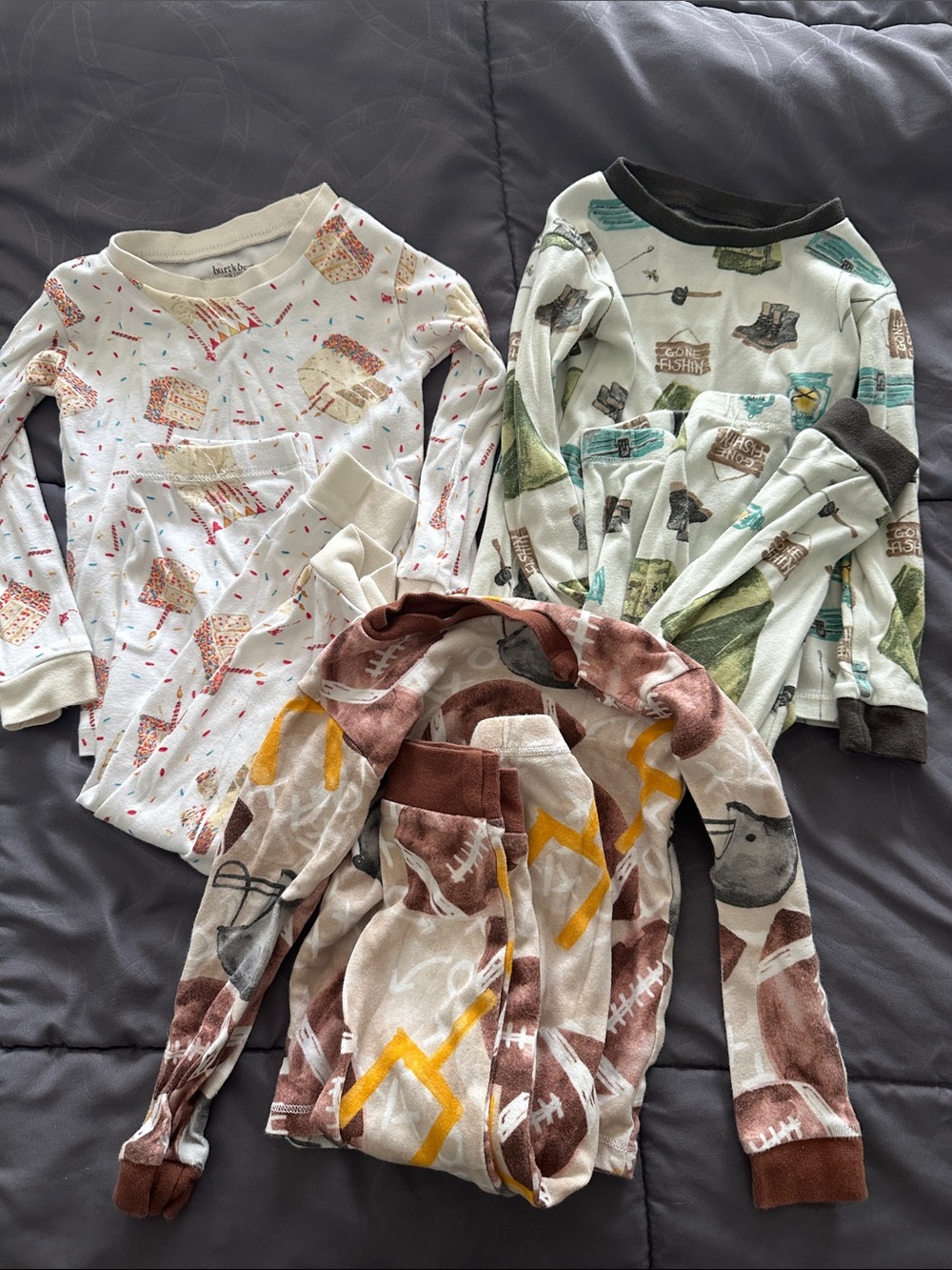 Burts Bee Baby Unisex Pajama Sets- birthday cake, football and gone fishing.